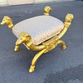Gilt ram-head upholstered footstool
